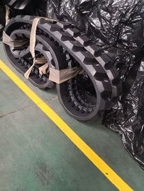 Pistas de goma resistentes de Kobelco, piezas pesadas del tren de aterrizaje del equipo del reemplazo